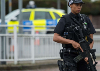 Police britannique (© OLI SCARFF - AFP)