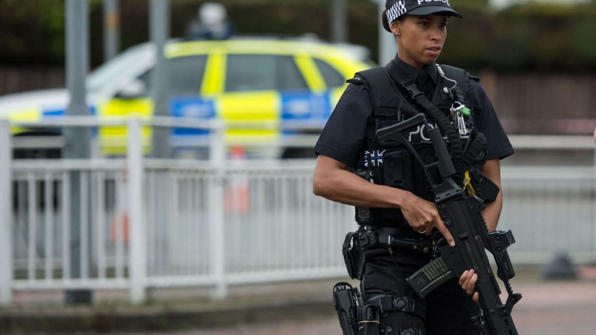 Police britannique (© OLI SCARFF - AFP)